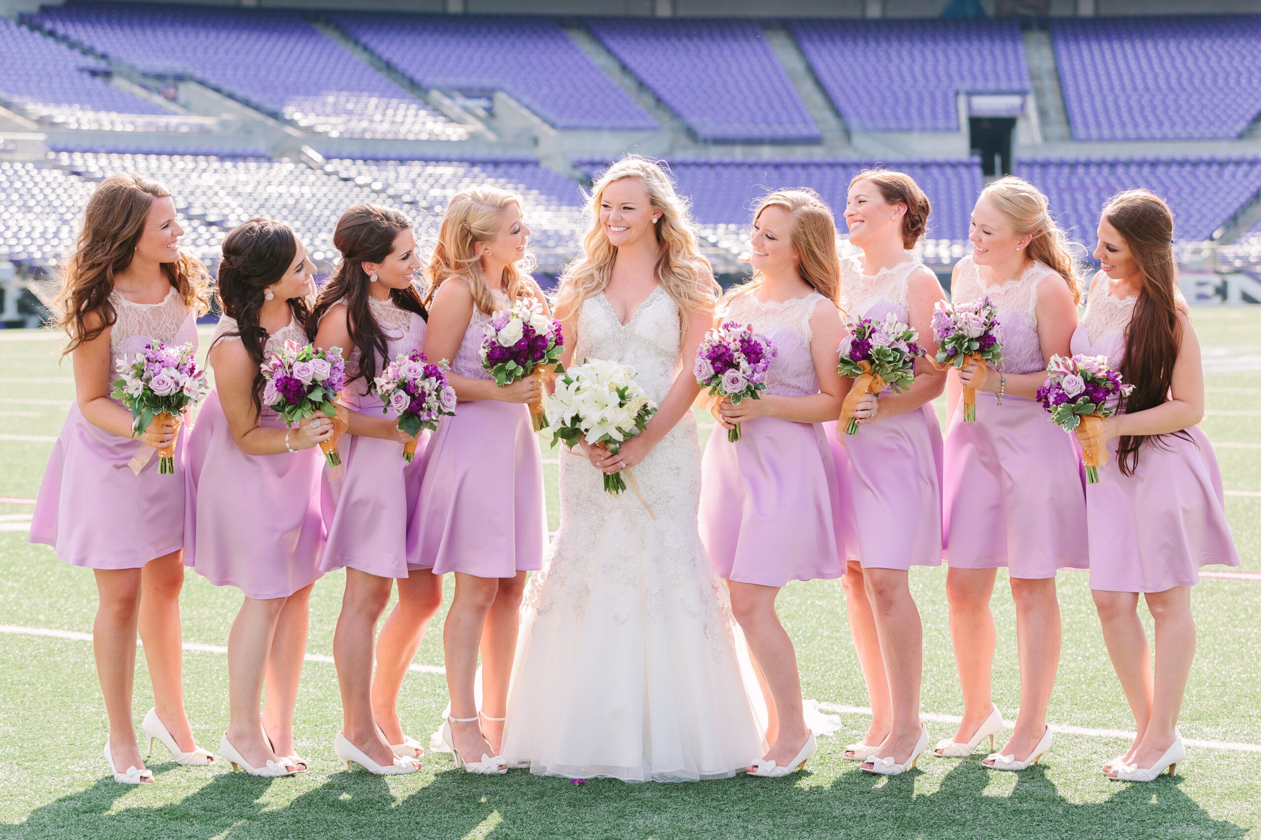 M&T Bank Stadium Baltimore Ravens Wedding. Photography by Lauren Myers Photography #RavensStadiumWedding #BaltimoreRavens #RavensNation #PurpleGoldWedding